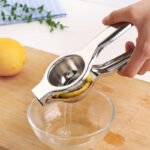 Stainless Steel Small Juice Press: Perfect for Home Use, Ideal for Freshly Squeezing Juice from Fruits.